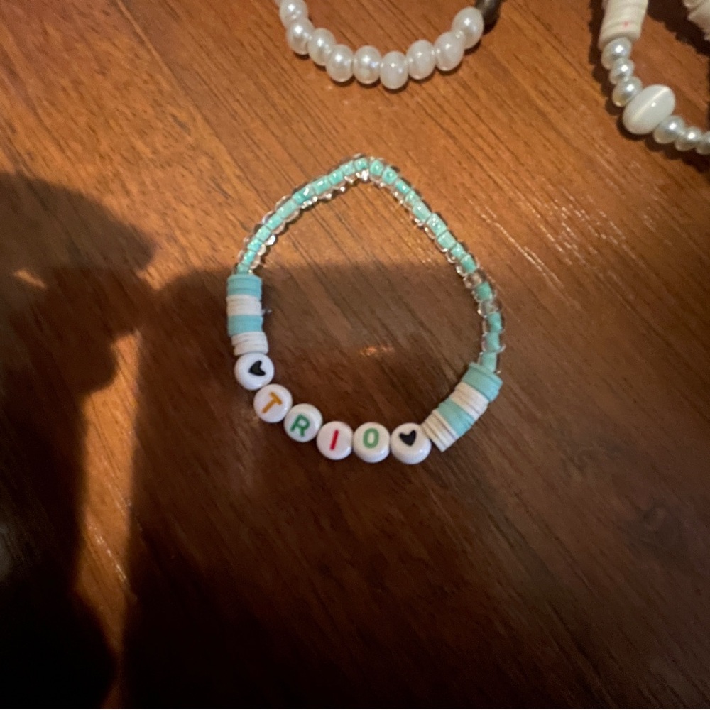 Bracelet that says trio handmade !